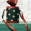 Handcrafted leather potli bag with bold colourful eye embroidery