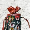 Handcrafted leather potli bag with bold colourful eye embroidery