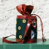 Handcrafted leather potli bag with bold colourful eye embroidery