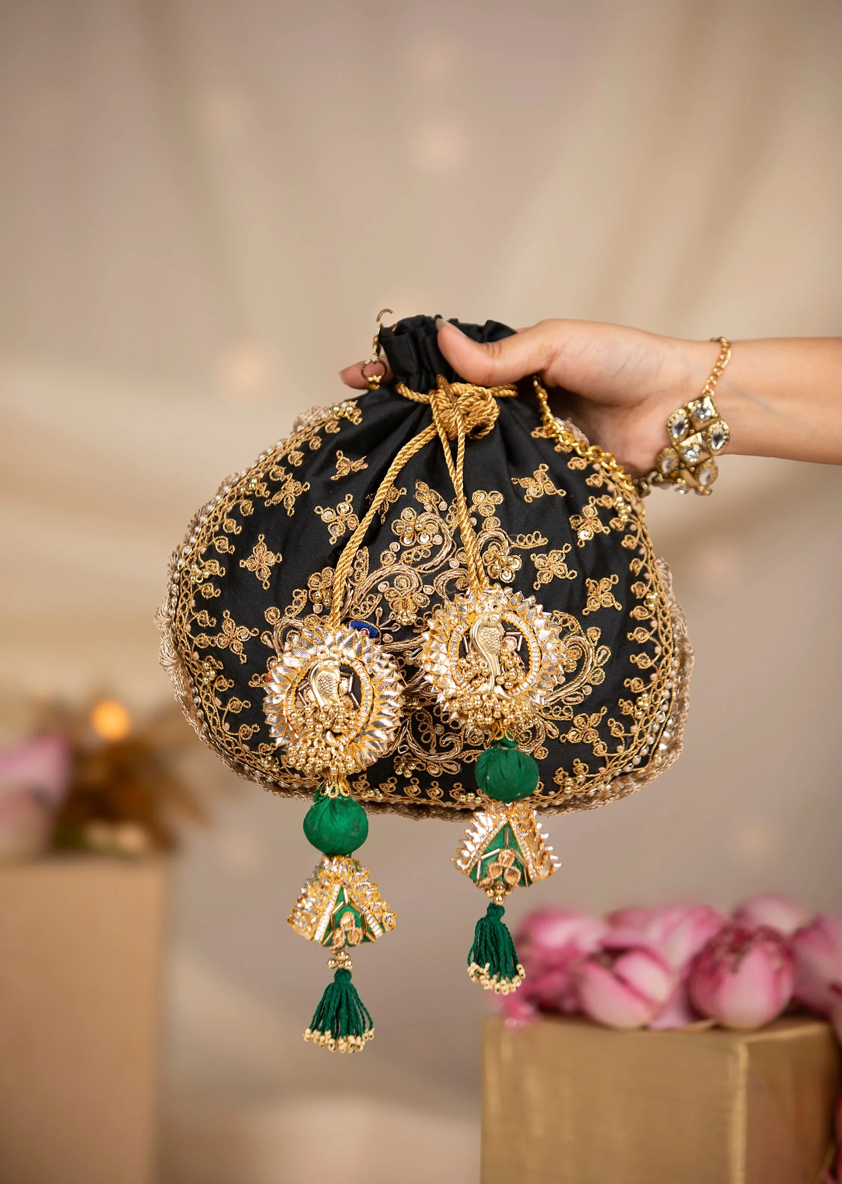 488-black-silk-embroidered-motifs-potli-bag-1.webp Black Silk Embroidered Motifs Potli Bag