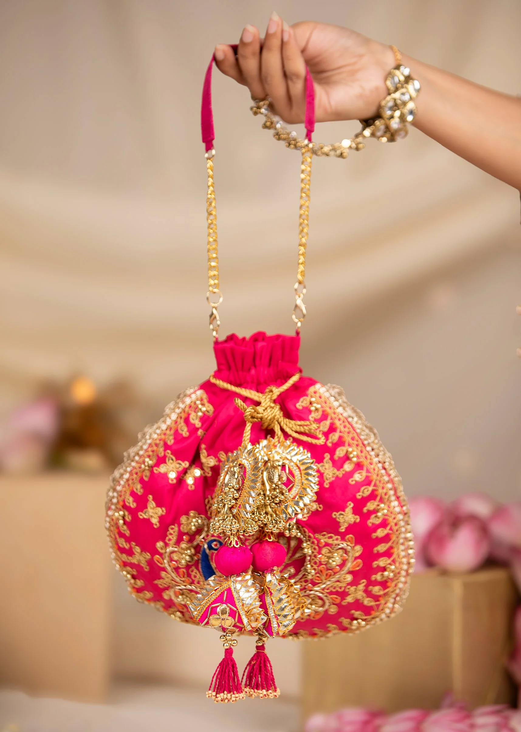 500-pink-embroidered-motif-potli-bag-1.webp Pink Embroidered Motif Potli Bag