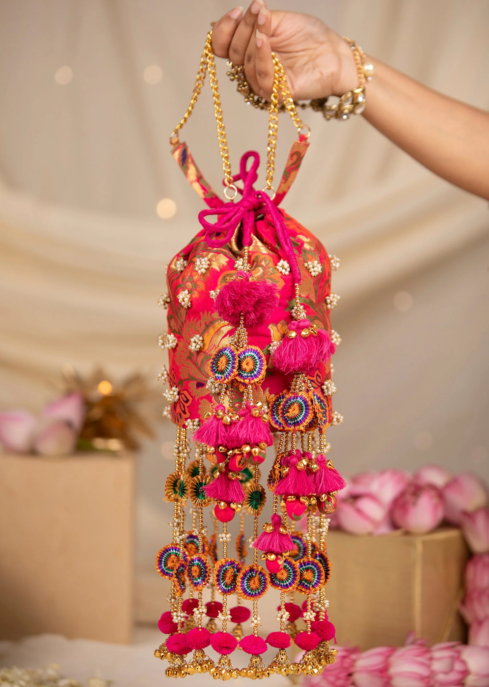 Pink Pearl Embellished Pom Pom Tassel Potli Bag