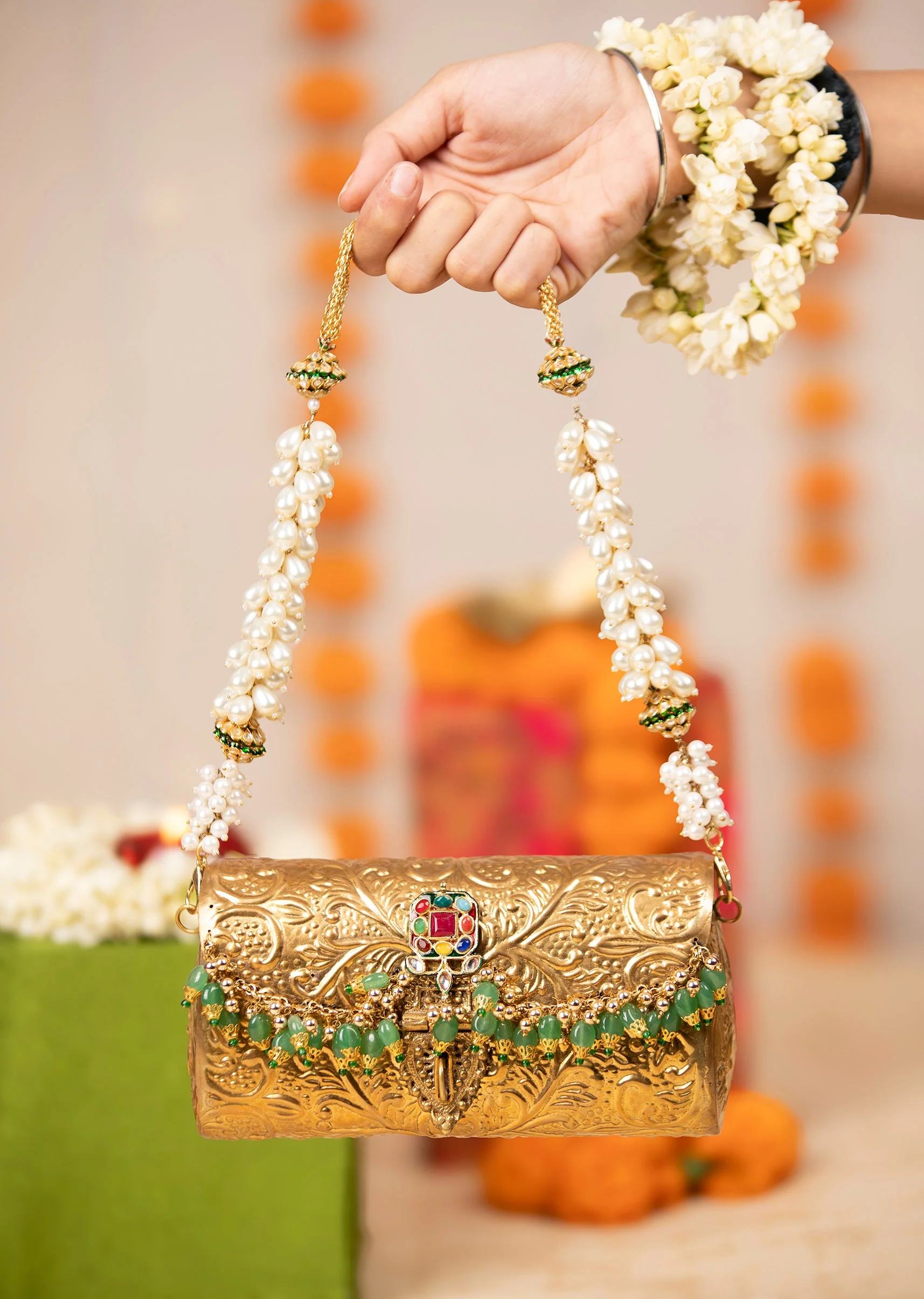 514-gold-floral-embossed-textured-metal-bag-1.webp Gold Floral Embossed Textured Metal Bag