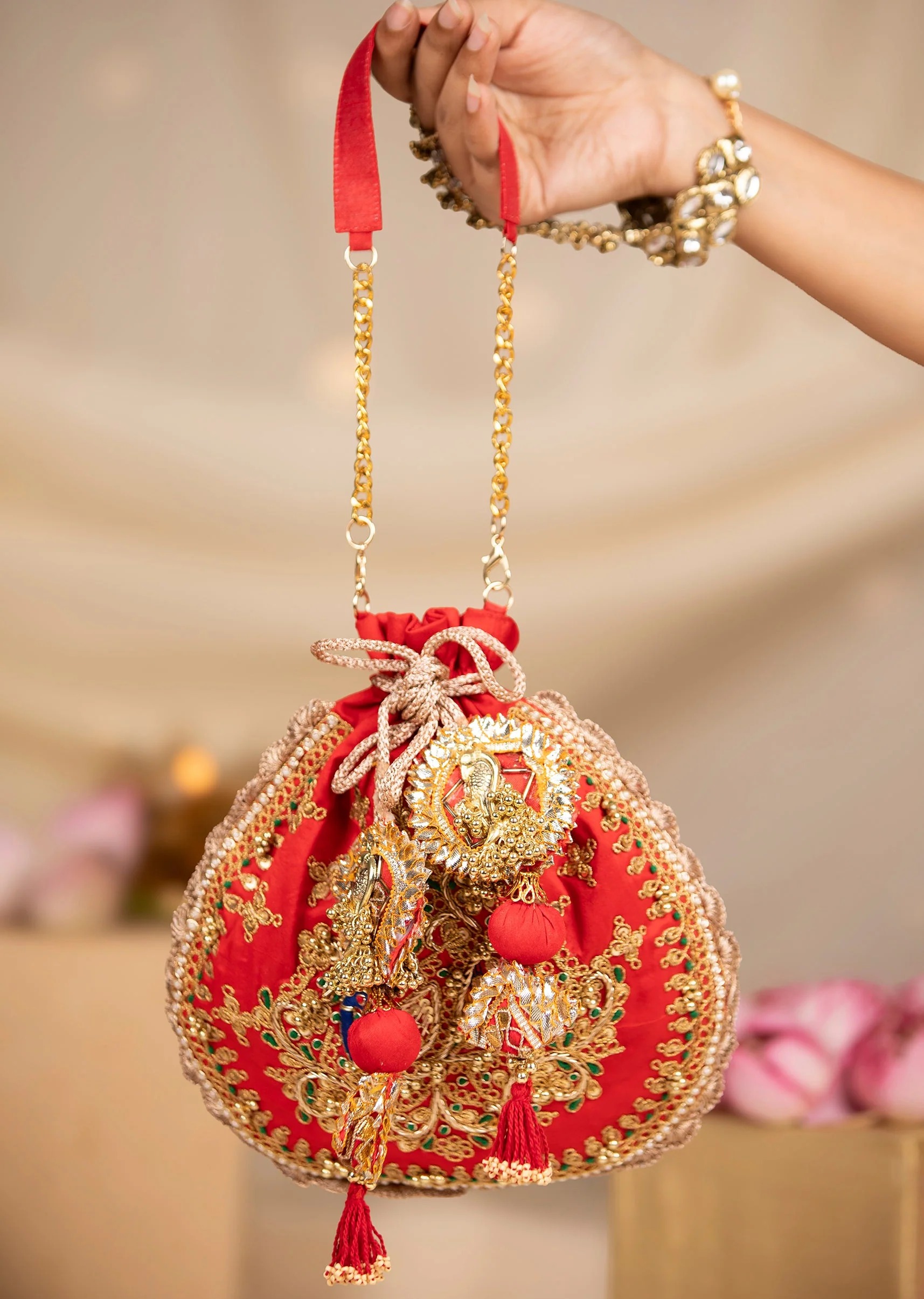 515-red-embroidered-motif-potli-bag-in-silk-1.webp Red Embroidered Motif Potli Bag in Silk
