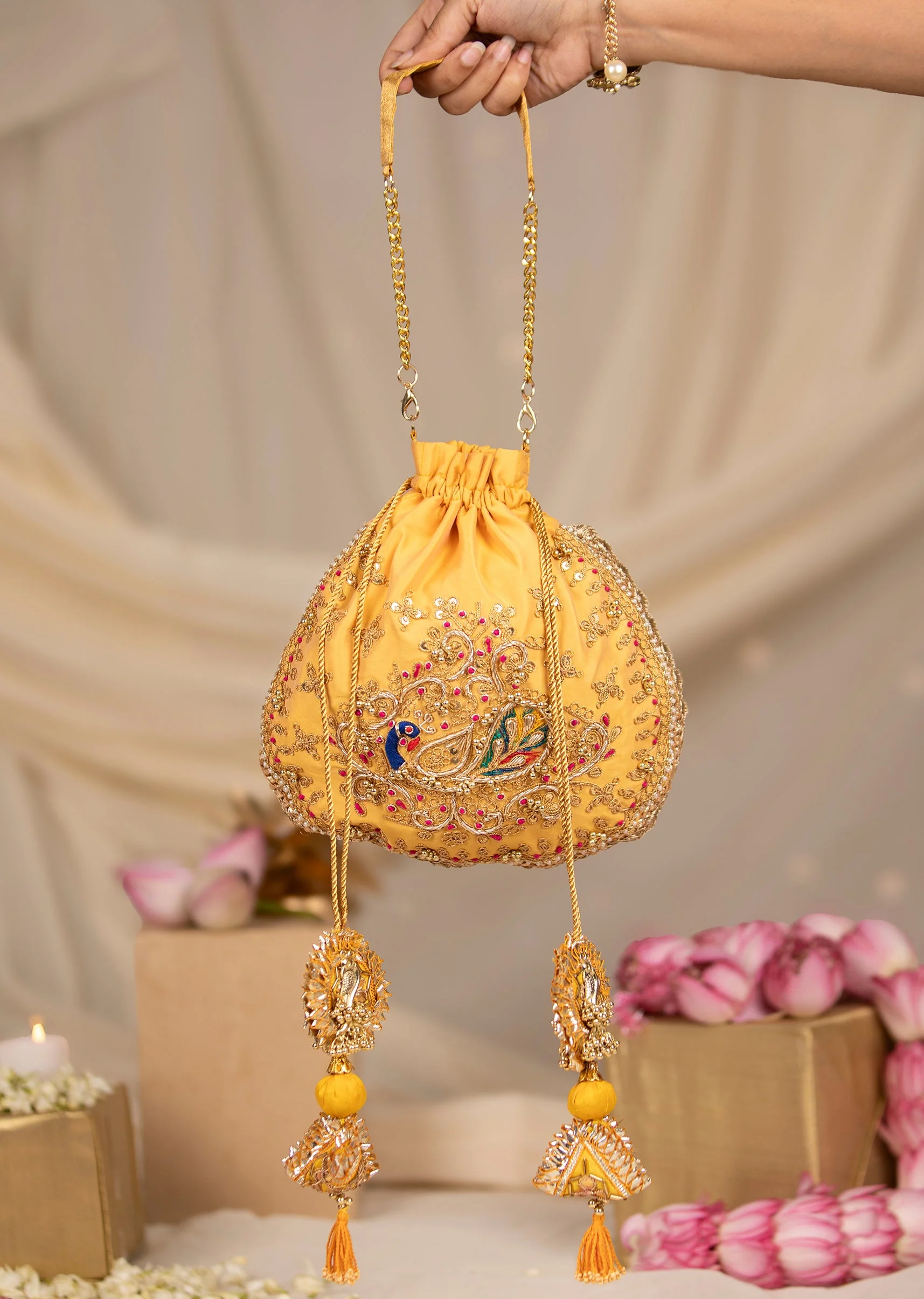 518-yellow-silk-peacock-motif-embroidered-potli-bag-1.webp Yellow Silk Peacock Motif Embroidered Potli Bag