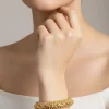 538-gold-toned-bangles-with-intricate-temple-motifs-and-simulated-stones-1.webp Gold Toned Bangles With Intricate Temple Motifs And Simulated Stones