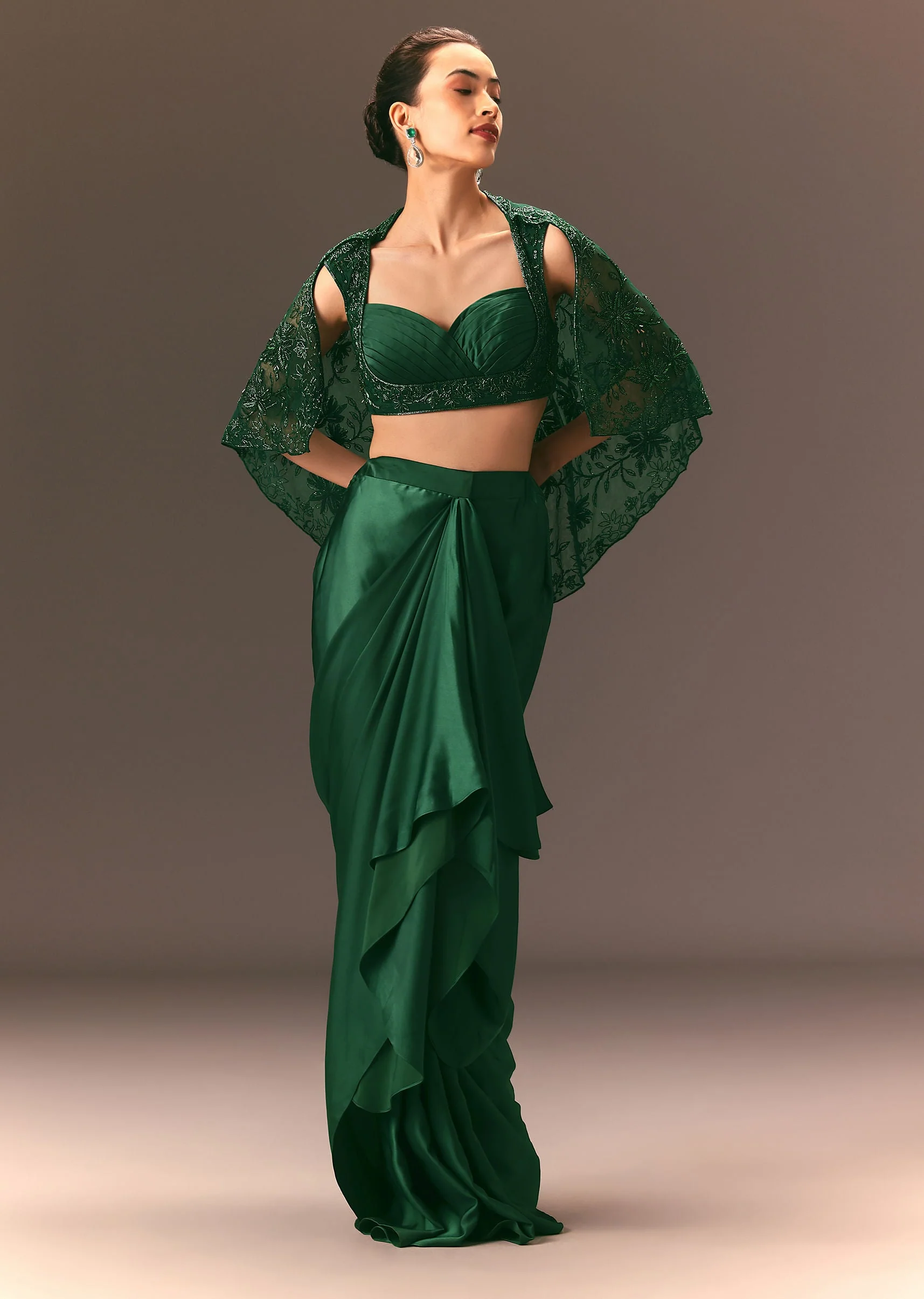 5425-bottle-green-net-hand-work-fusion-draped-skirt-set-1.webp Bottle Green Net Hand Work Fusion Draped Skirt Set