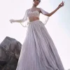 White Ruched Lehenga With Spaghetti Blouse And Cape