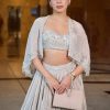 White Ruched Lehenga With Spaghetti Blouse And Cape
