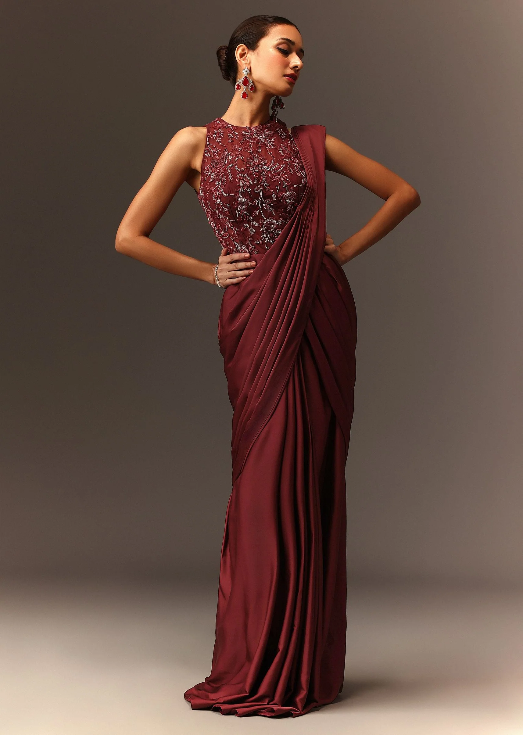 5654-masala-maroon-net-satin-draped-saree-with-hand-embroidered-blouse-1.webp Masala Maroon Net Satin Draped Saree With Hand Embroidered Blouse