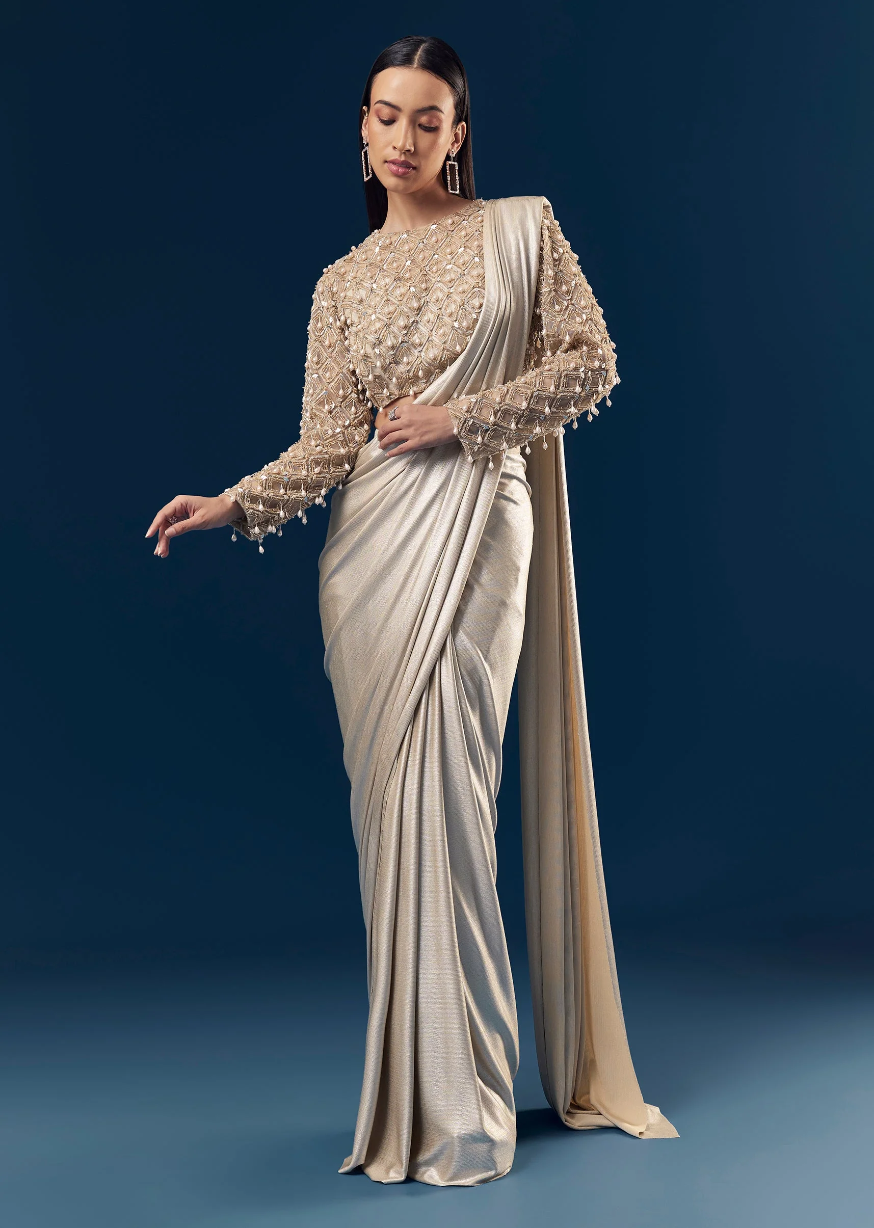 5669-gold-ready-pleated-saree-with-full-sleeve-pearl-detailed-blouse-1.webp Gold Ready Pleated Saree With Full Sleeve Pearl Detailed Blouse