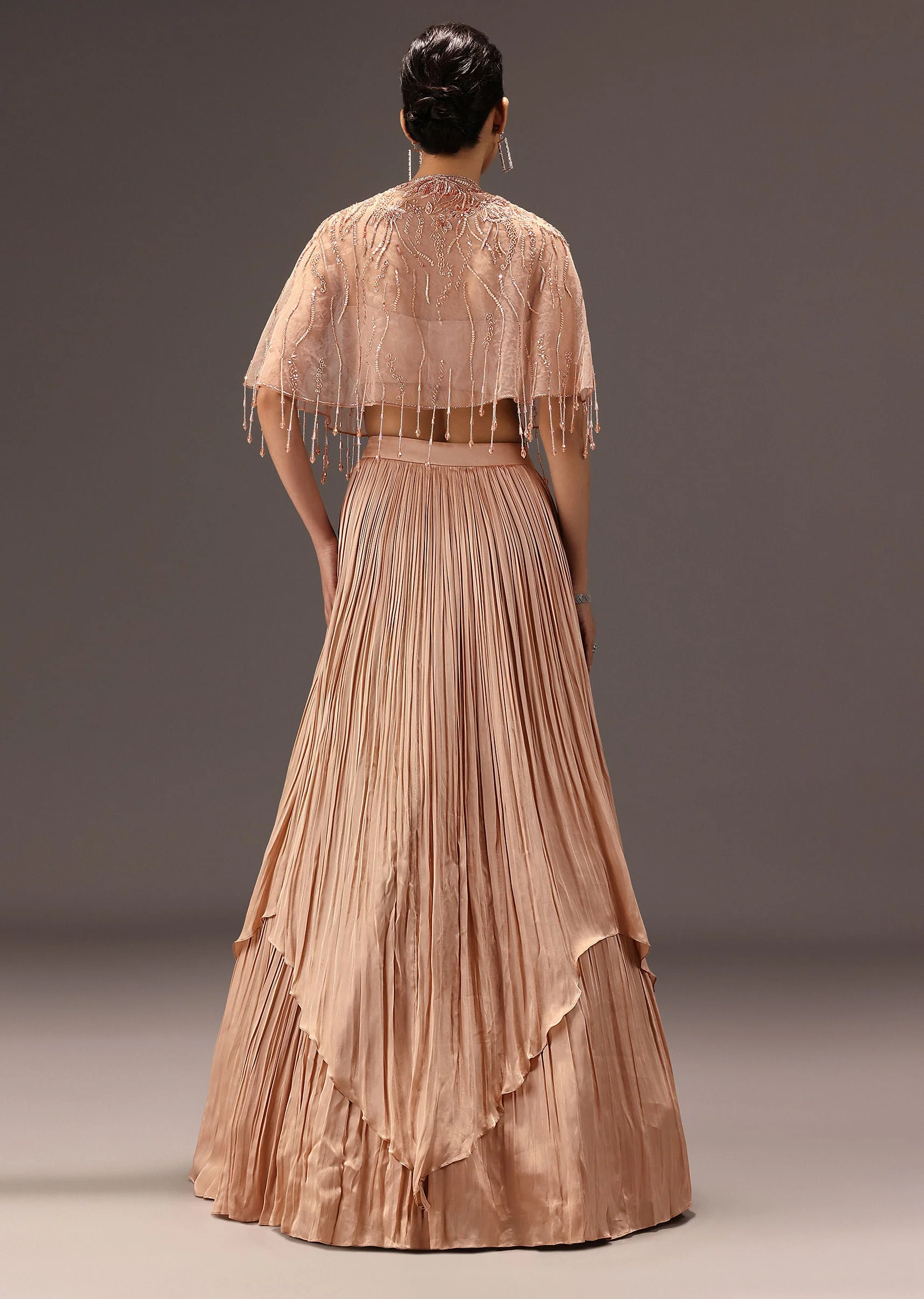 nude Ruched Blouse With Cape And Layered Skirt
