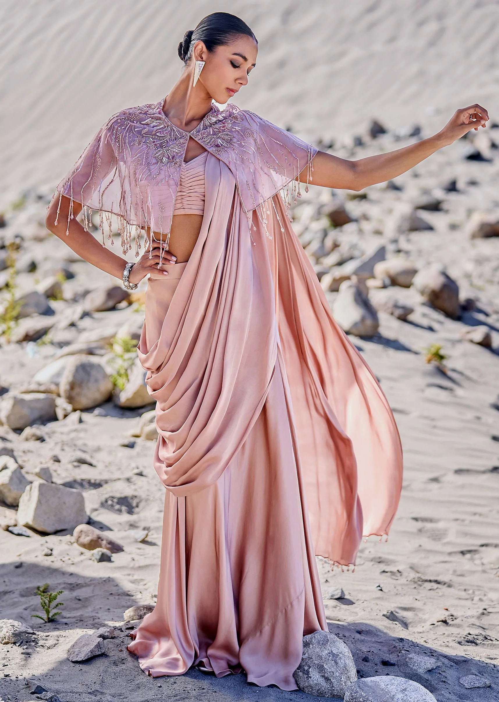 5833-beige-satin-draped-saree-with-pleated-blouse-and-embroidered-cape-1.webp Beige Satin Draped Saree With Pleated Blouse And Embroidered Cape