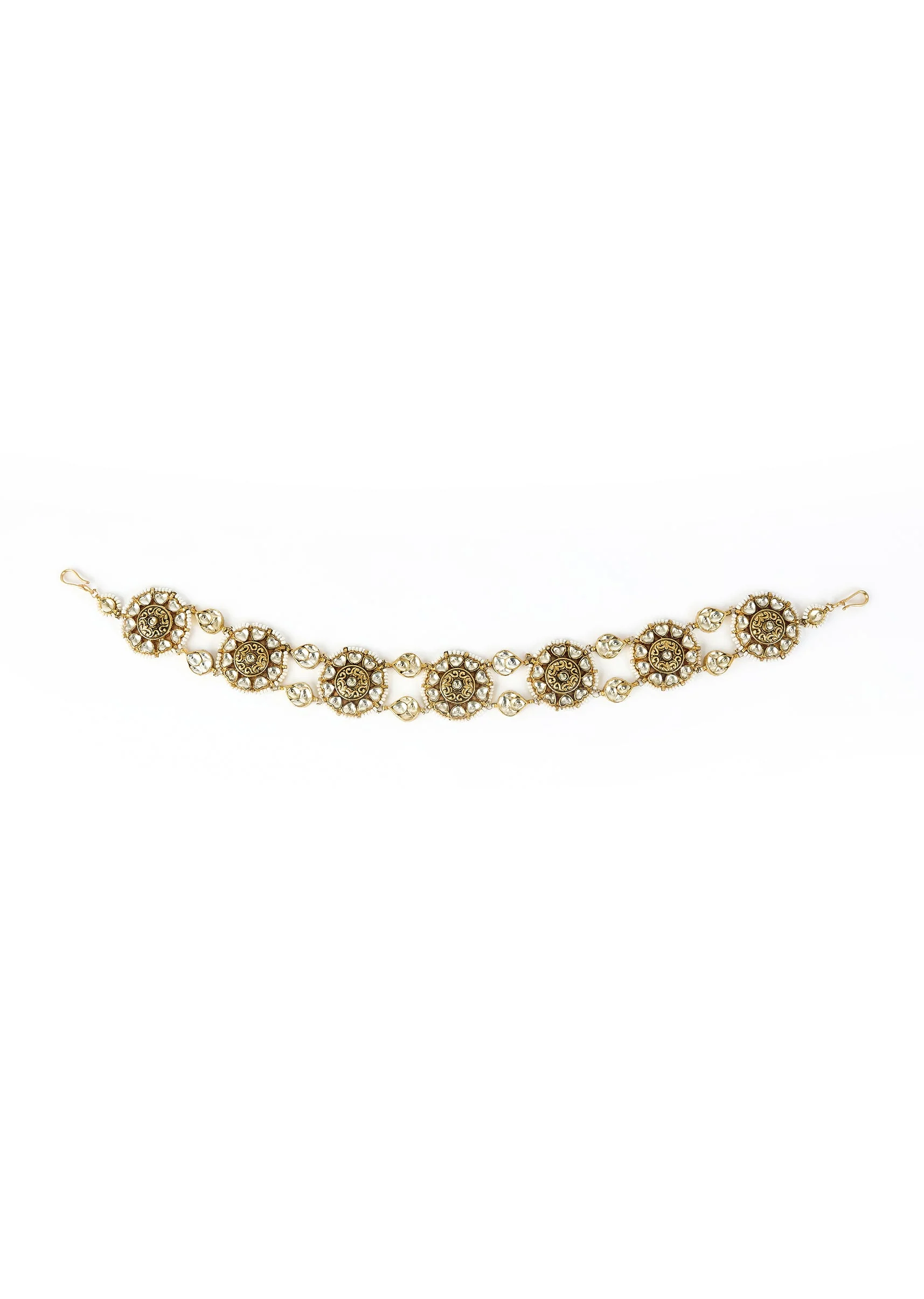 587-gold-plated-circular-motifs-adorned-with-pearls-and-crystal-maathapatti-1.webp Gold Plated Circular Motifs Adorned With Pearls And Crystal Maathapatti