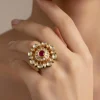 Gold Tone Oversized Ring With Red Stone and Kundan Detailing