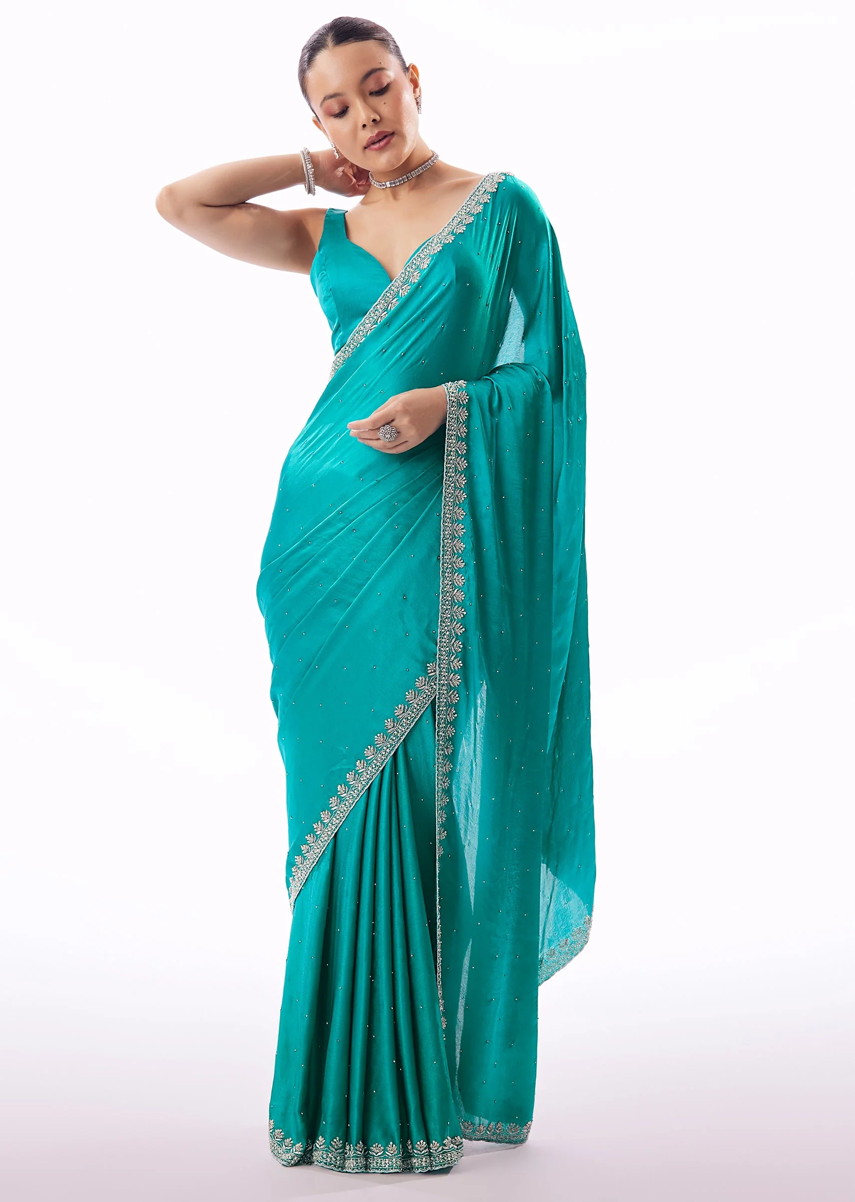 5997-turquoise-blue-chinon-saree-with-stone-and-cutdana-embroidered-border-1.webp Turquoise Blue Chinon Saree With Stone And Cutdana Embroidered Border