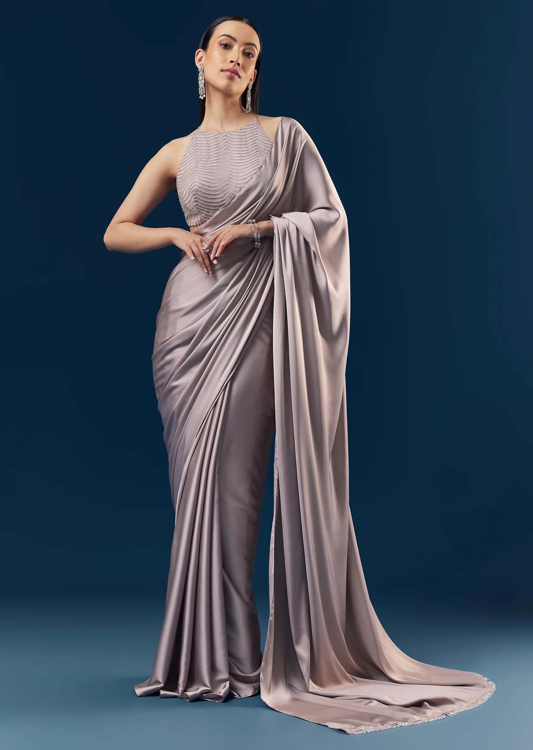 6021-mauve-satin-plain-saree-with-cut-dana-embellished-halter-neck-blouse-1.webp Mauve Satin Plain Saree With Cut Dana Embellished Halter Neck Blouse