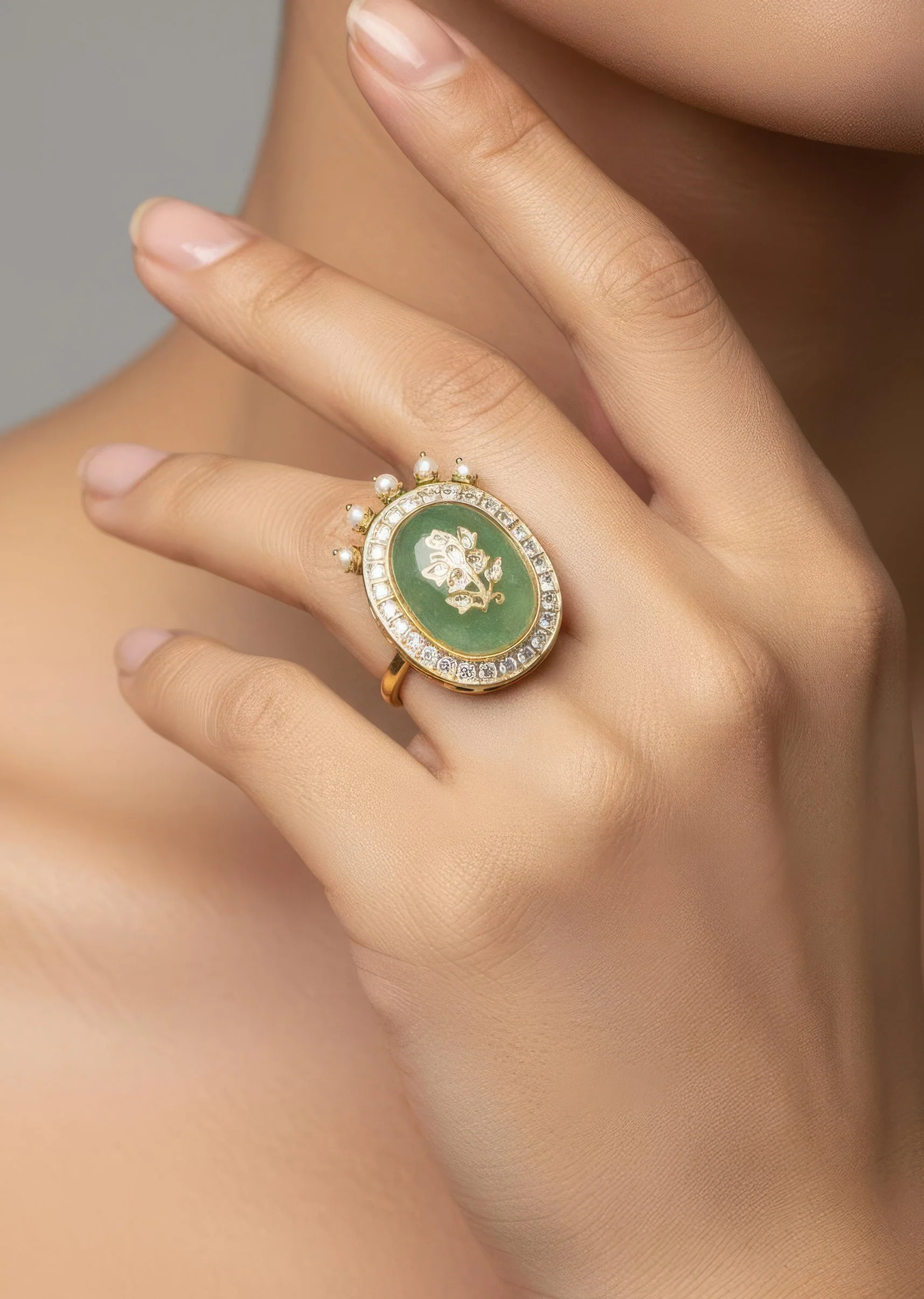 607-green-stone-and-pearl-embellished-statement-ring-1.webp Green Stone And Pearl Embellished Statement Ring