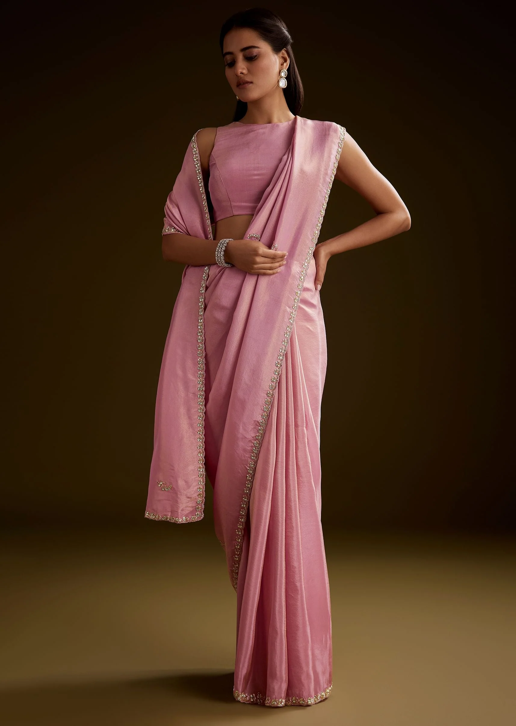 6084-pink-tissue-saree-with-cutdana-embroidery-and-scallop-border-1.webp Pink Tissue Saree With Cutdana Embroidery And Scallop Border
