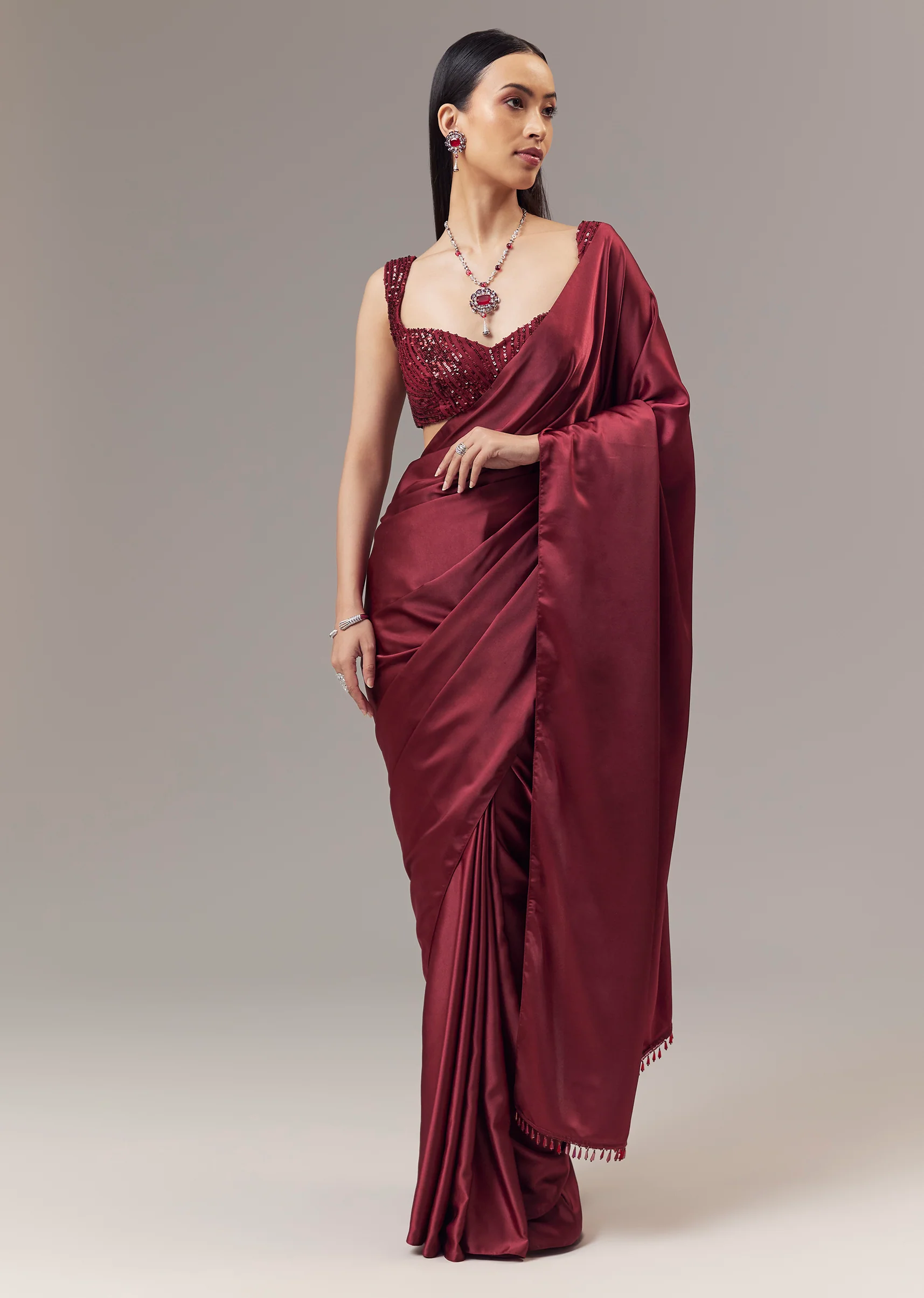 6100-red-satin-blend-saree-with-cut-dana-and-sequin-embellished-blouse-1.webp Red Satin Blend Saree With Cut Dana And Sequin Embellished Blouse