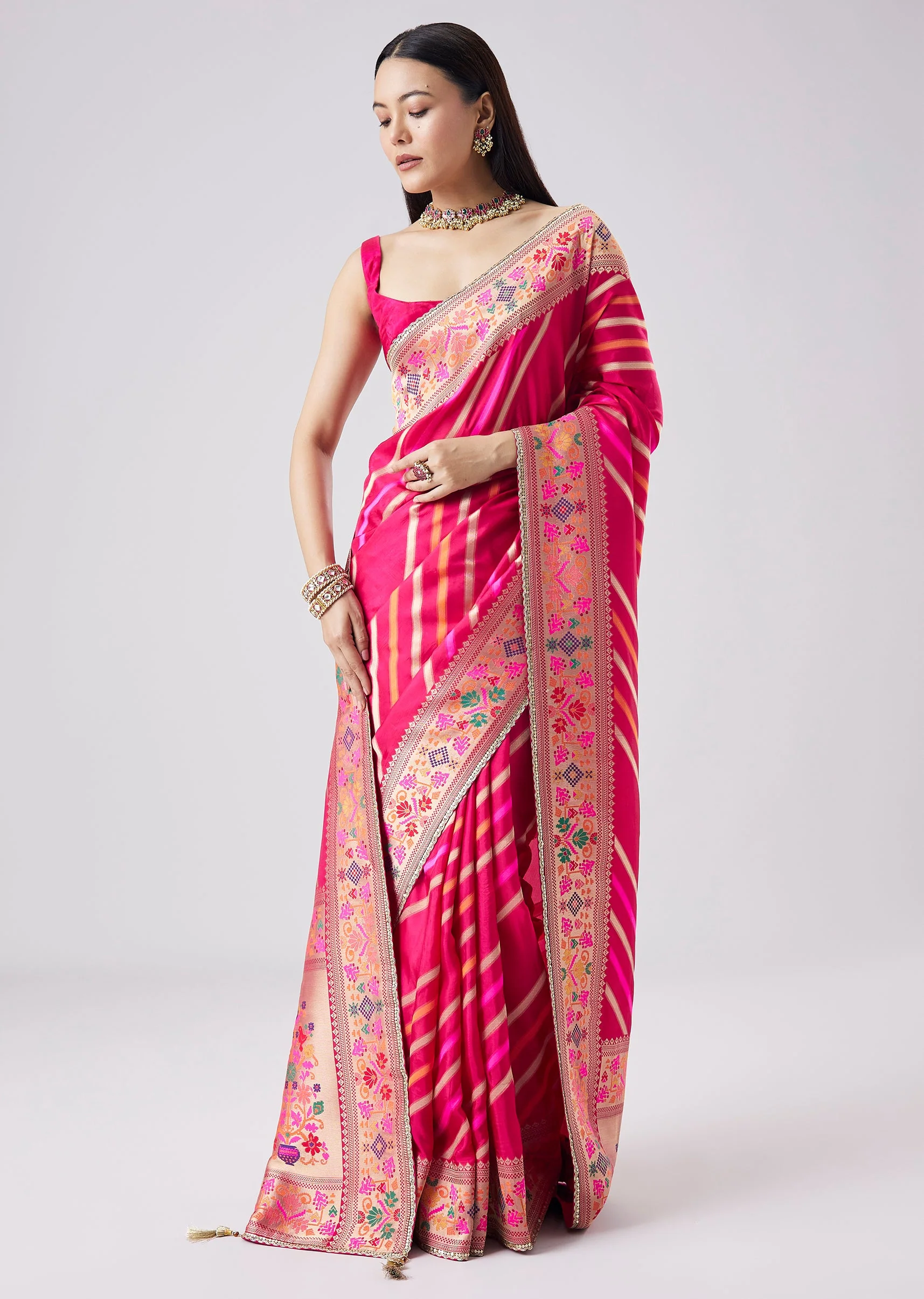 Rani Pink Woven Saree With Unstitched Blouse