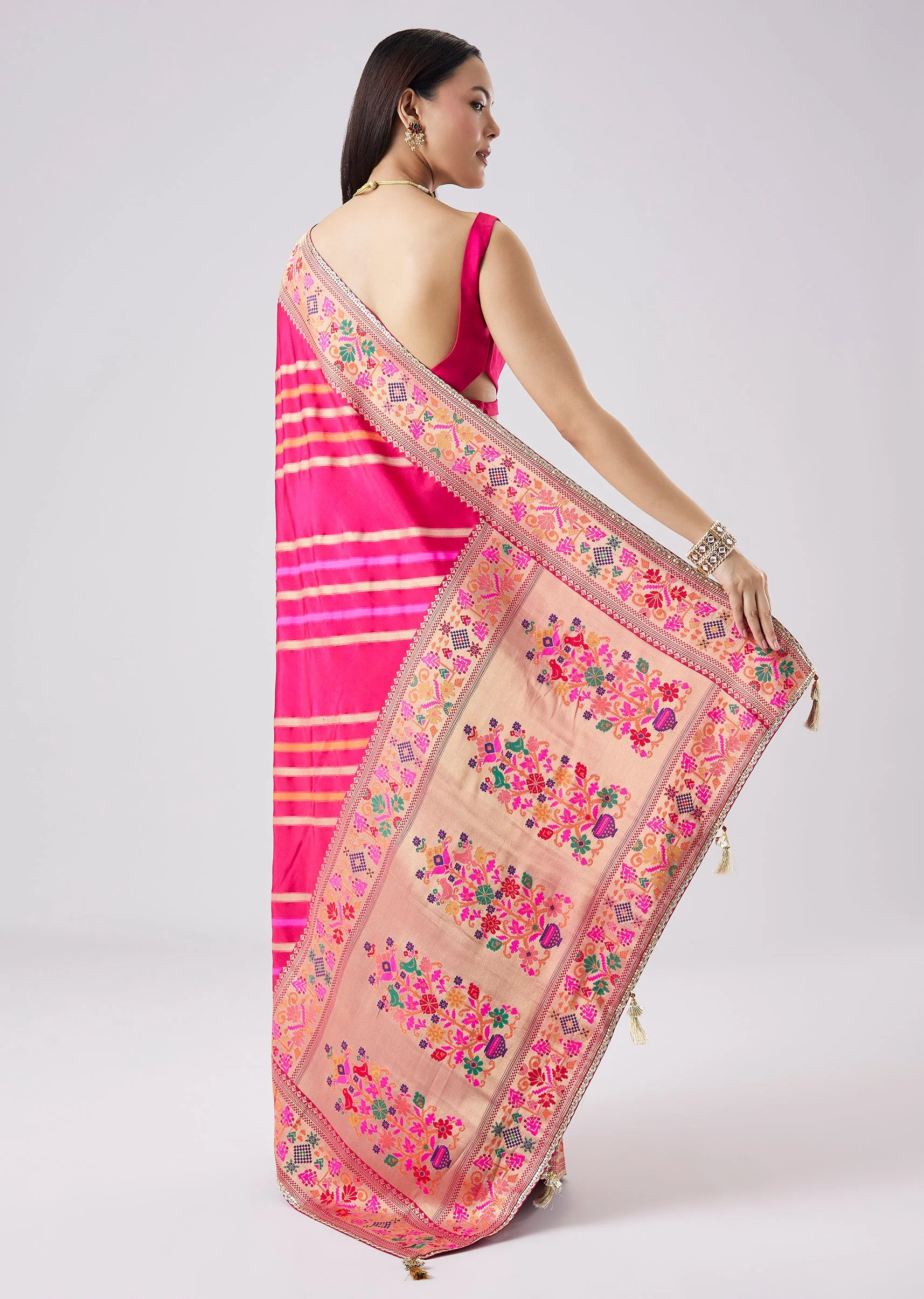 Rani Pink Woven Saree With Unstitched Blouse