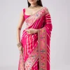 Rani Pink Woven Saree With Unstitched Blouse