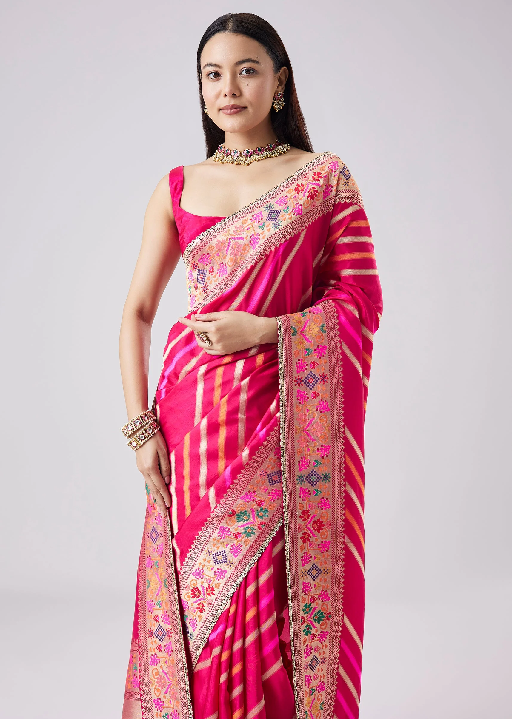 Rani Pink Woven Saree With Unstitched Blouse