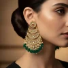 Gold Chandelier Earrings With Sparkling Kundan Work Pearls And Green Beads