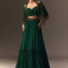 Bottle Green Tiered Lehenga With Net Cape
