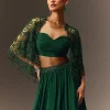Bottle Green Tiered Lehenga With Net Cape