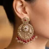 White Stone Chandbali Earrings With Floral Motifs And Pink Bead Drops