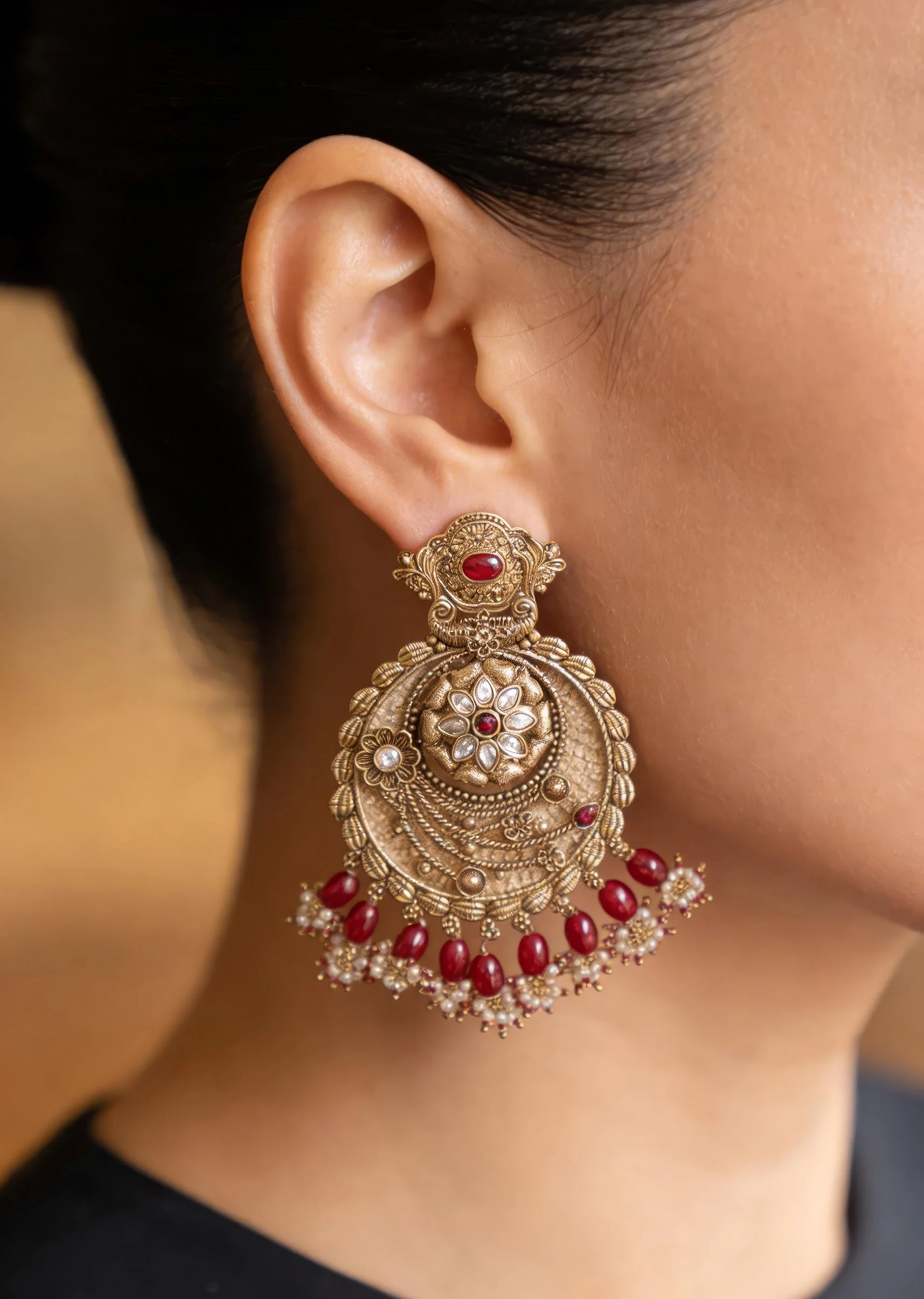 White Stone Chandbali Earrings With Floral Motifs And Pink Bead Drops