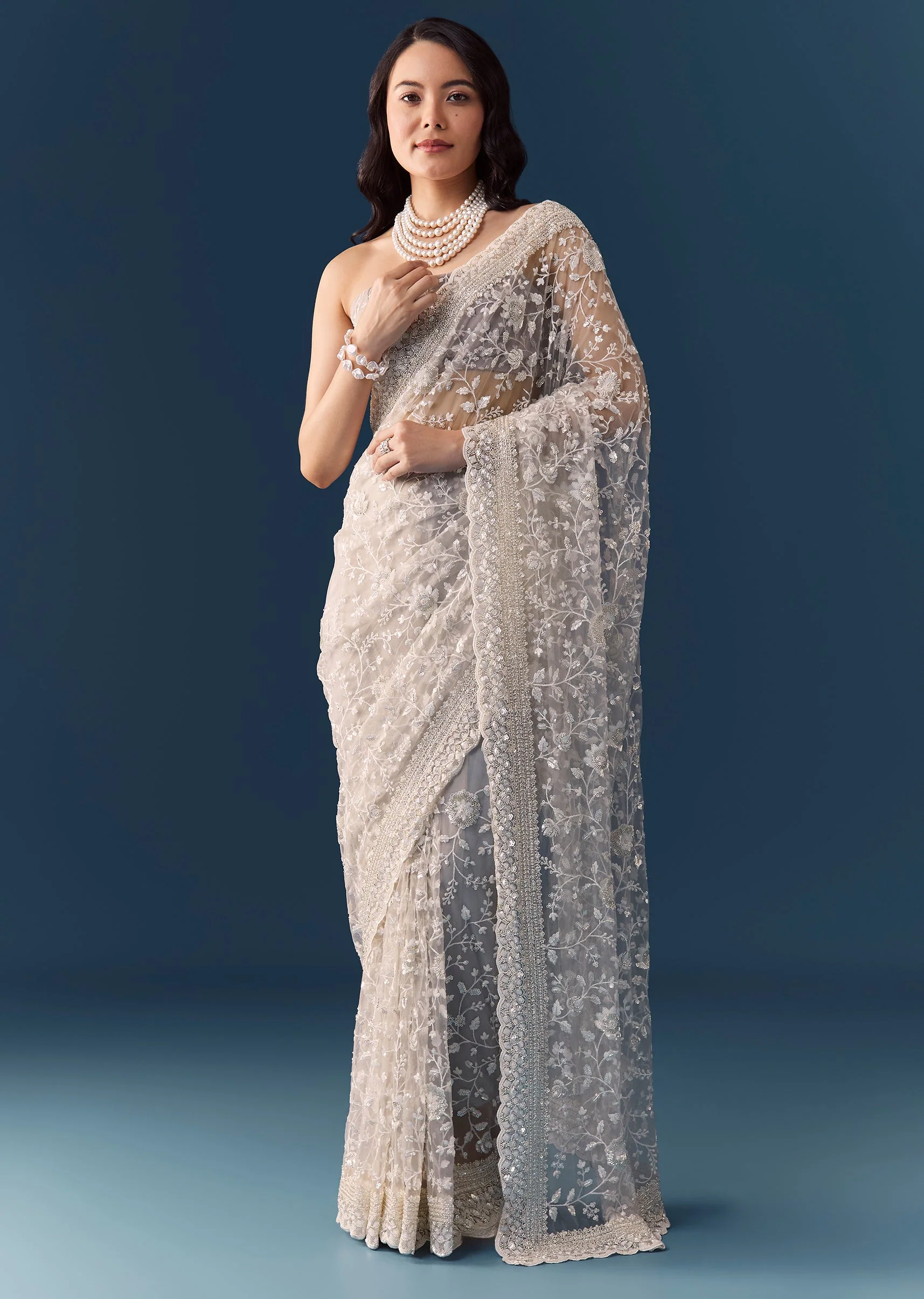 6611-grey-floral-jaal-embellished-saree-with-unstitched-blouse-1.webp Grey Floral Jaal Embellished Saree with Unstitched Blouse