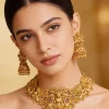 665-gold-finish-temple-style-necklace-set-with-green-and-pink-simulated-stones-1.webp Gold Finish Temple Style Necklace Set With Green and Pink Simulated Stones