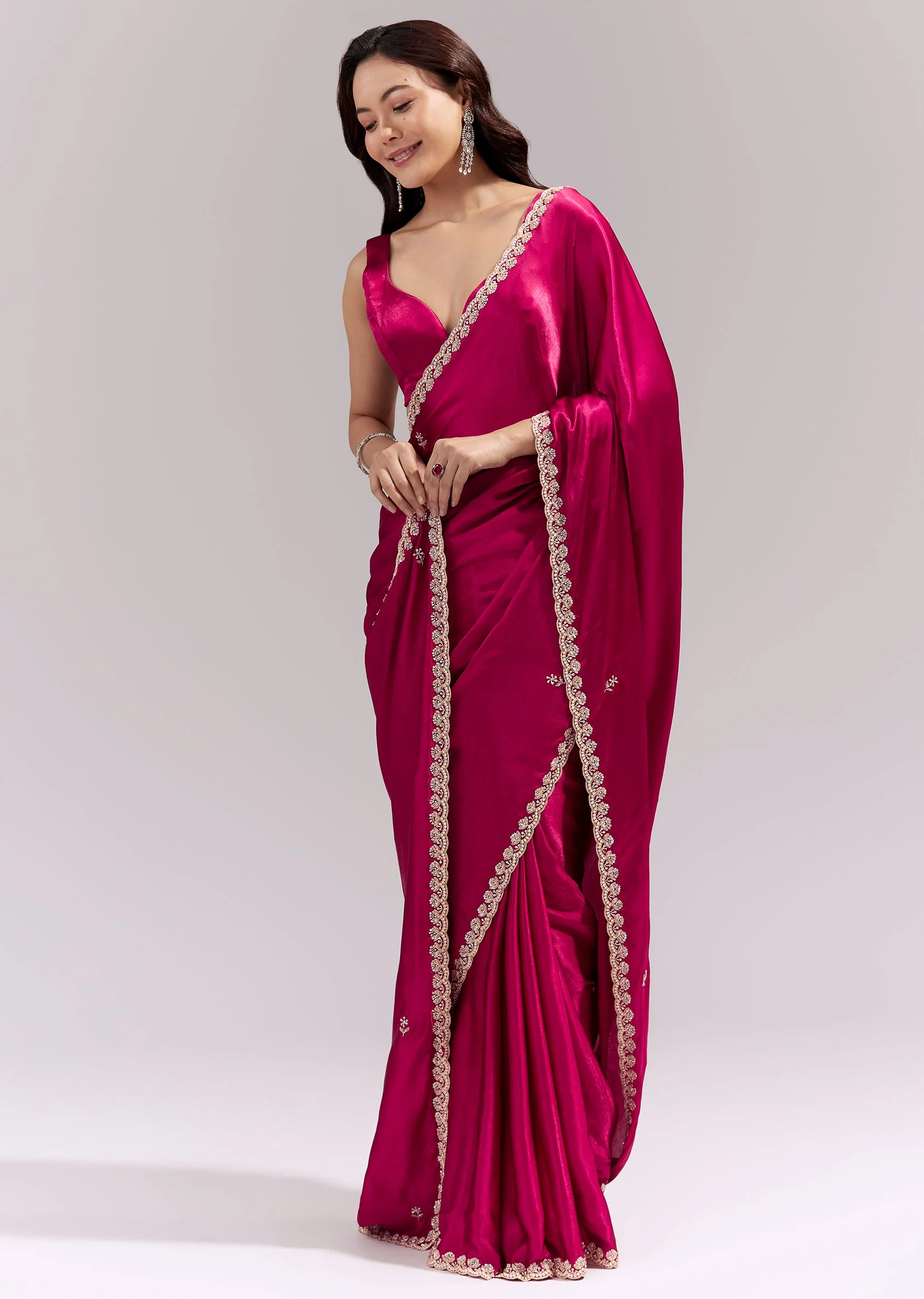 6681-coral-red-satin-chinon-saree-with-scalloped-moti-embroidered-border-and-buttis-1.webp Coral Red Satin Chinon Saree With Scalloped Moti Embroidered Border And Buttis