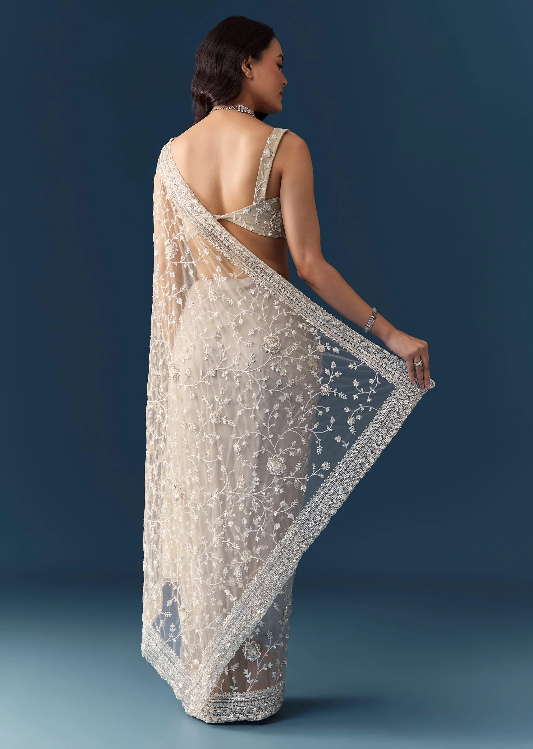 6783-off-white-net-jaal-embellished-saree-with-unstitched-blouse-1.webp Off White Net Jaal Embellished Saree with Unstitched Blouse