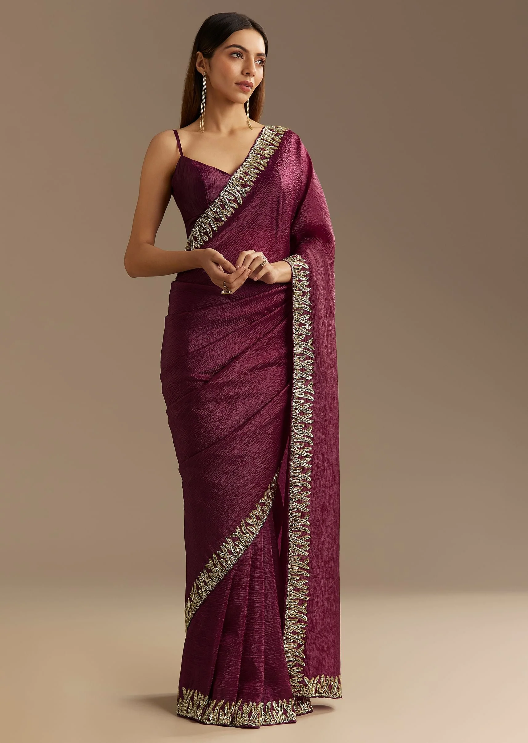 6815-wine-crushed-tissue-saree-with-cutdana-and-stone-embroidery-1.webp Wine Crushed Tissue Saree With Cutdana And Stone Embroidery