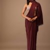 Blood Red Satin Saree With Fringes On The Pallu Paired With Hand Embroidered Bustier