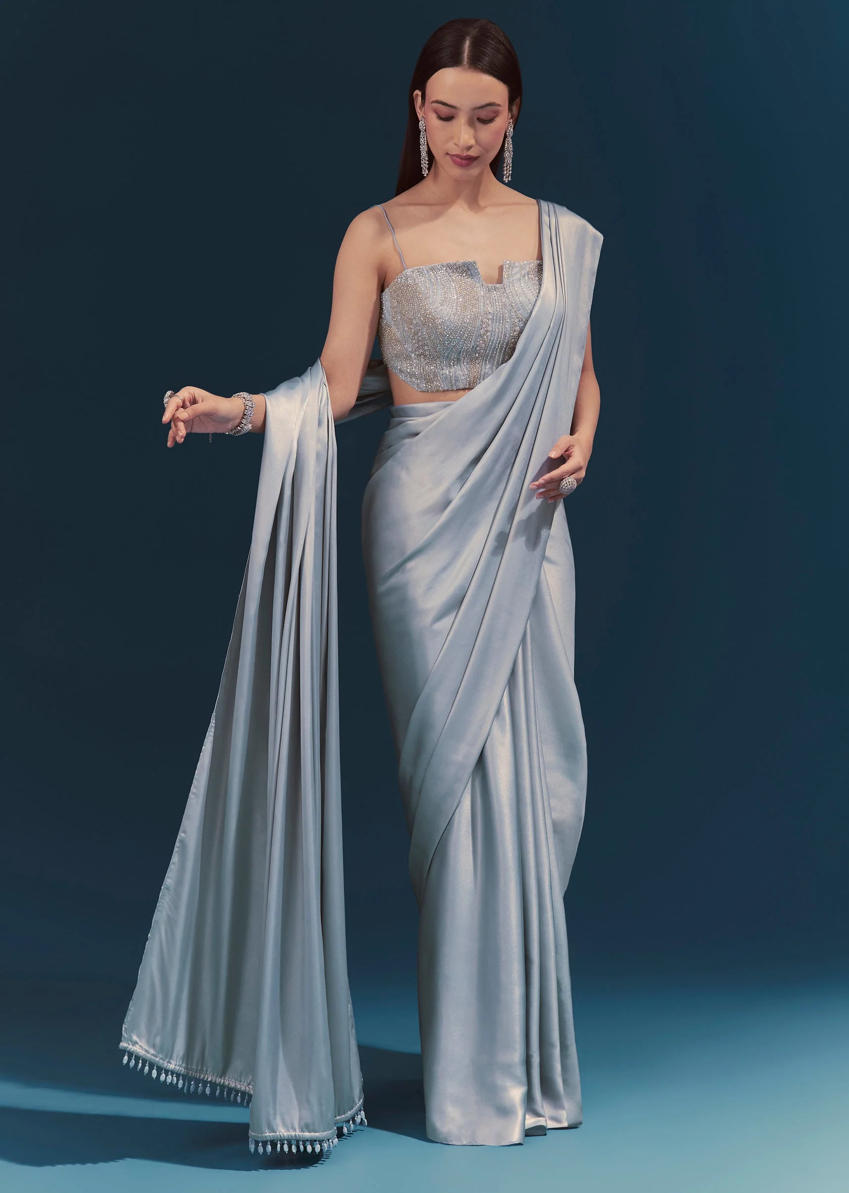 7067-light-blue-corset-blouse-with-unstitched-saree-1.webp Light Blue Corset Blouse With Unstitched Saree