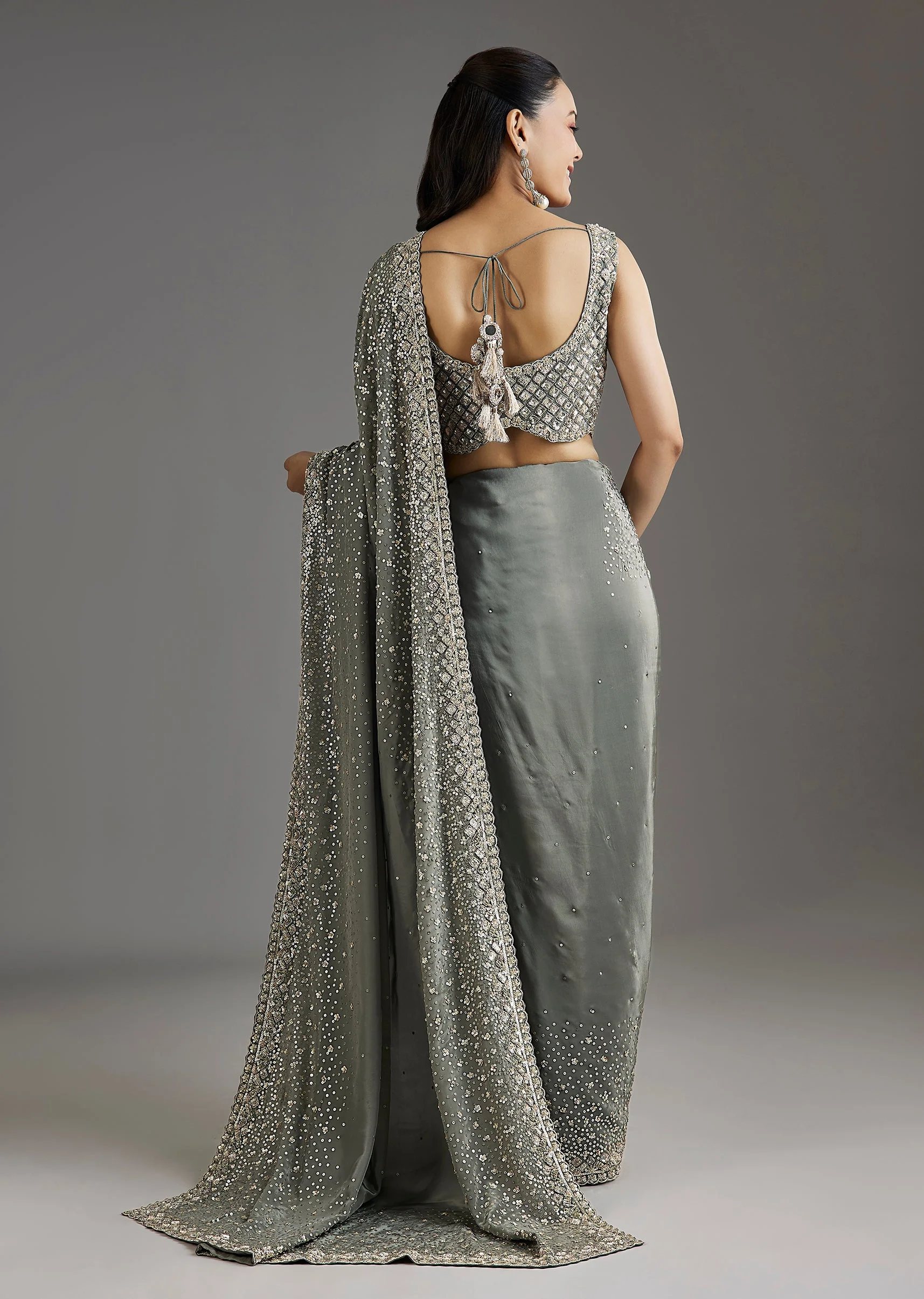 Grey Metallic Green Crepe Saree With Embellished Border