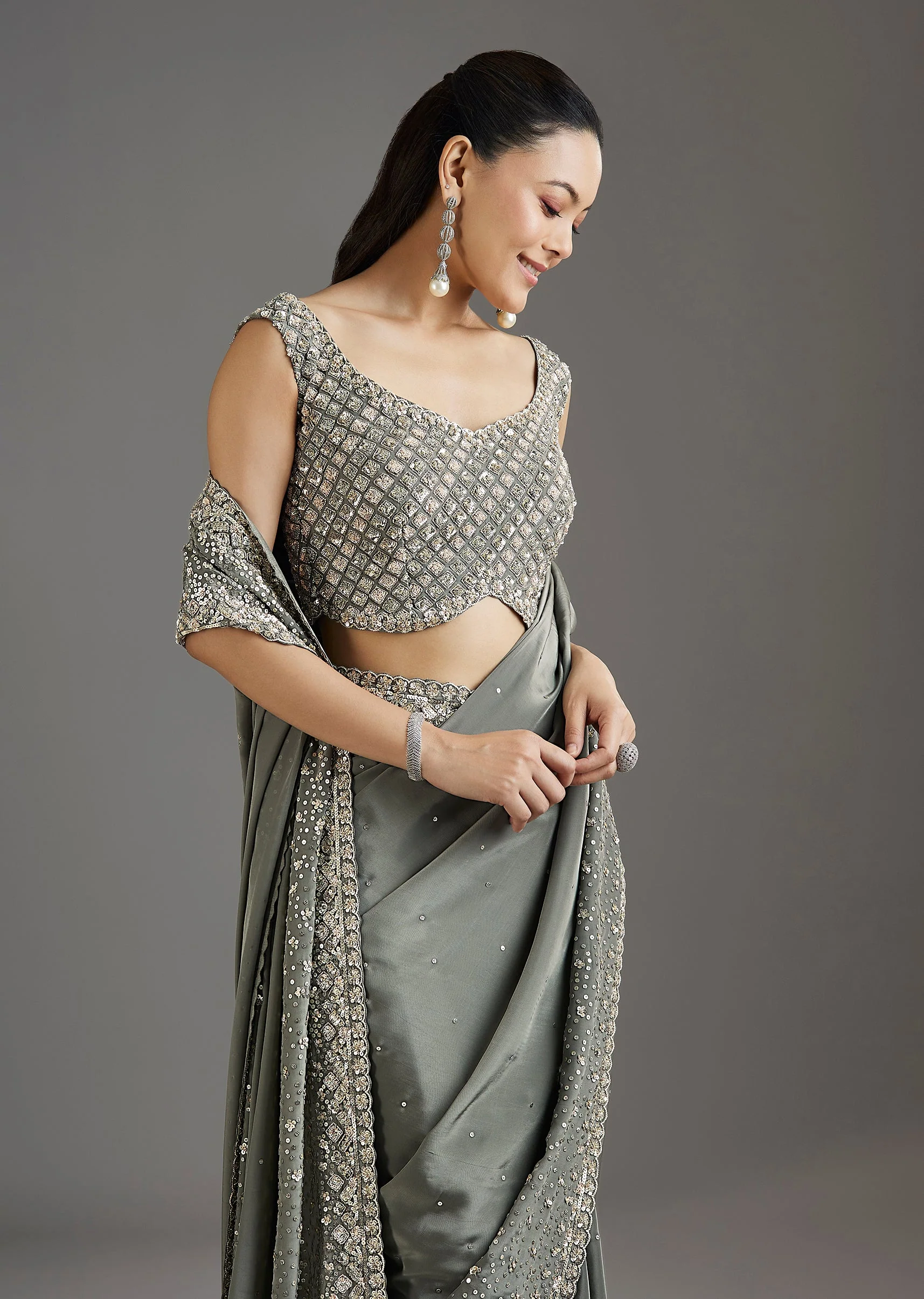 Grey Metallic Green Crepe Saree With Embellished Border