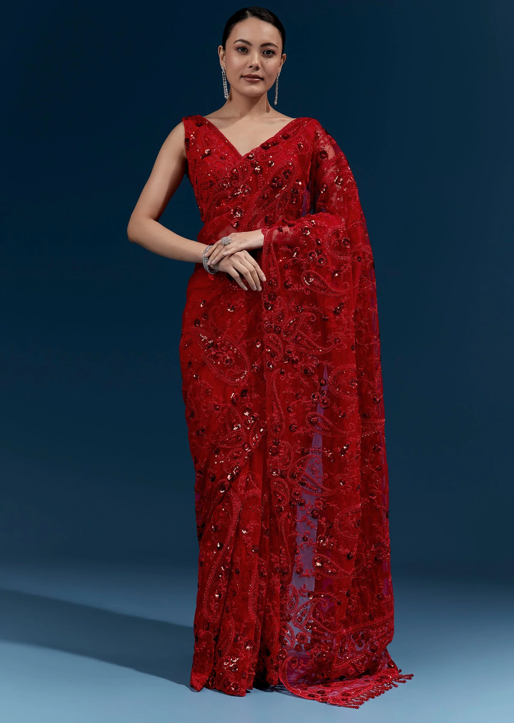 7209-red-heavy-embroidered-net-saree-with-floral-work-and-tasselled-pallu-1.webp Red Heavy Embroidered Net Saree With Floral Work And Tasselled Pallu