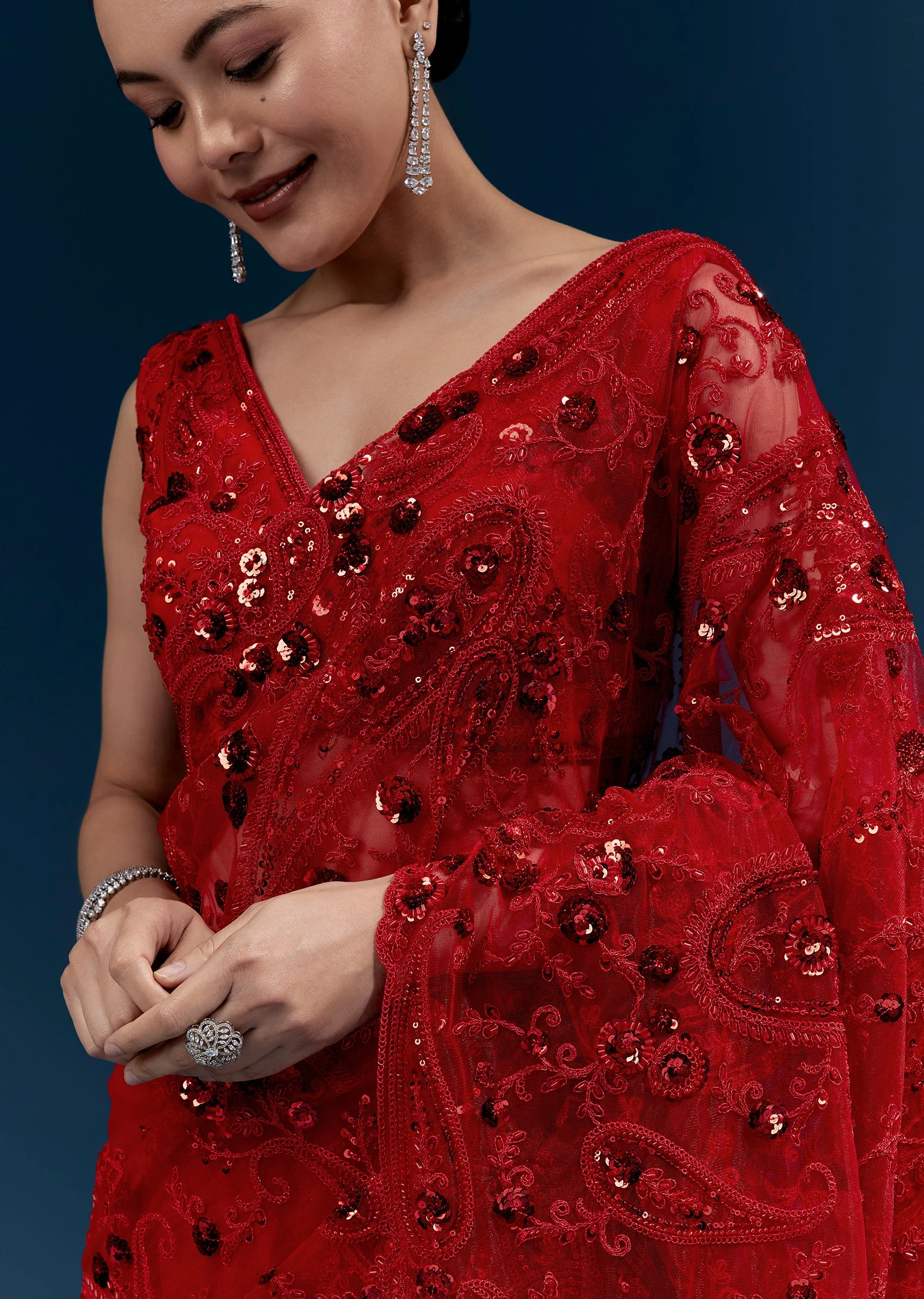 Red Heavy Embroidered Net Saree With Floral Work And Tasselled Pallu
