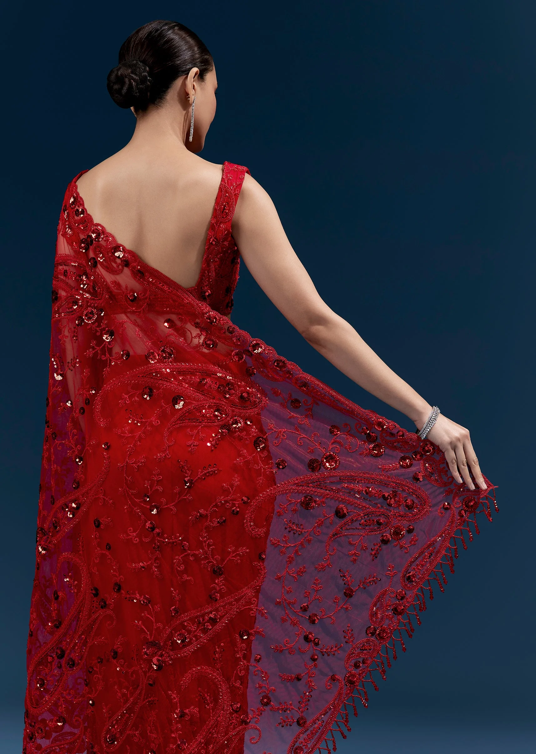 Red Heavy Embroidered Net Saree With Floral Work And Tasselled Pallu