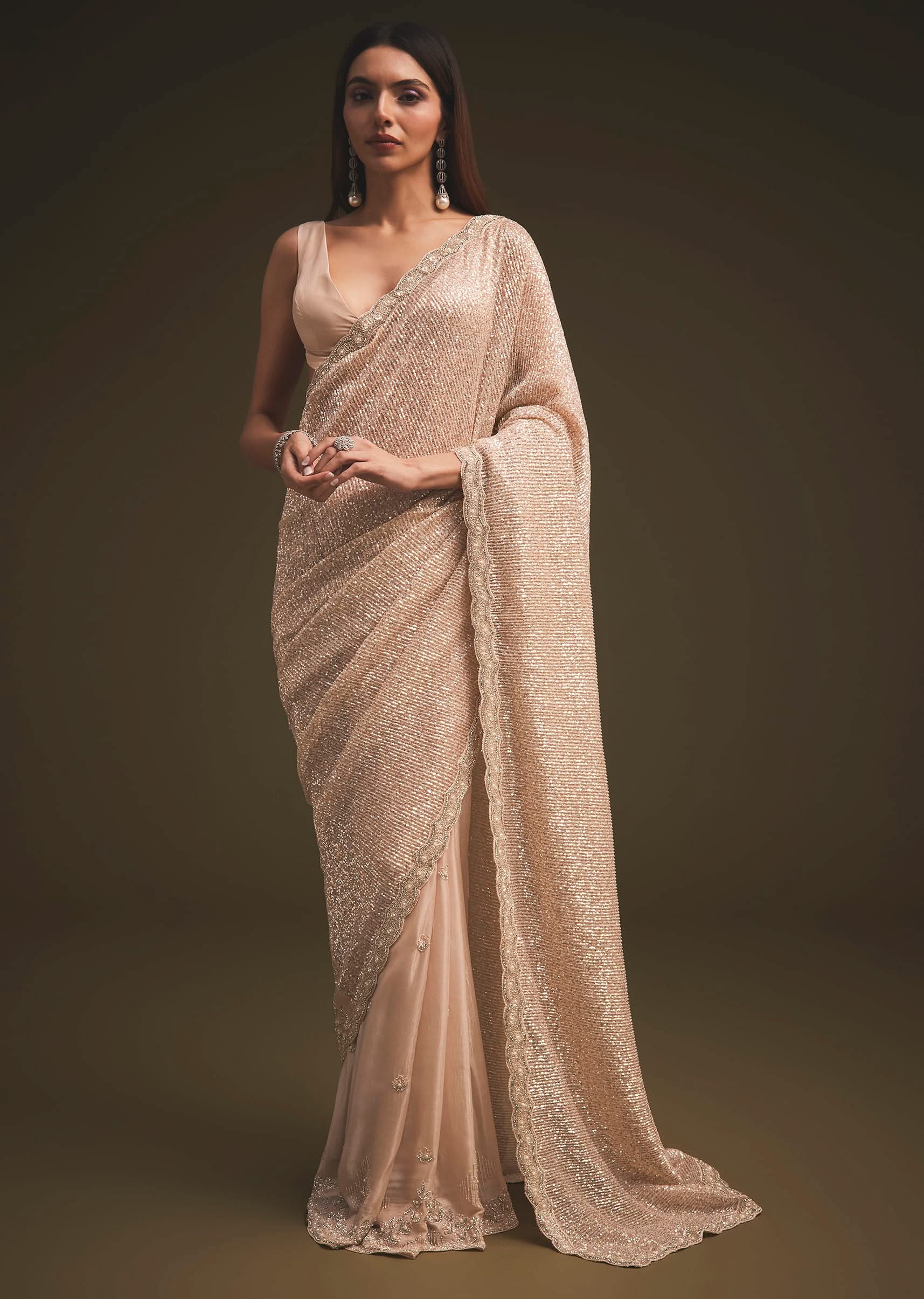 Gold Sequins Saree With An Embellished Border