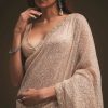 Gold Sequins Saree With An Embellished Border