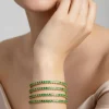 724-gold-finish-bangle-with-traditional-temple-motifs-and-green-simulated-stones-1.webp Gold Finish Bangle With Traditional Temple Motifs And Green Simulated Stones