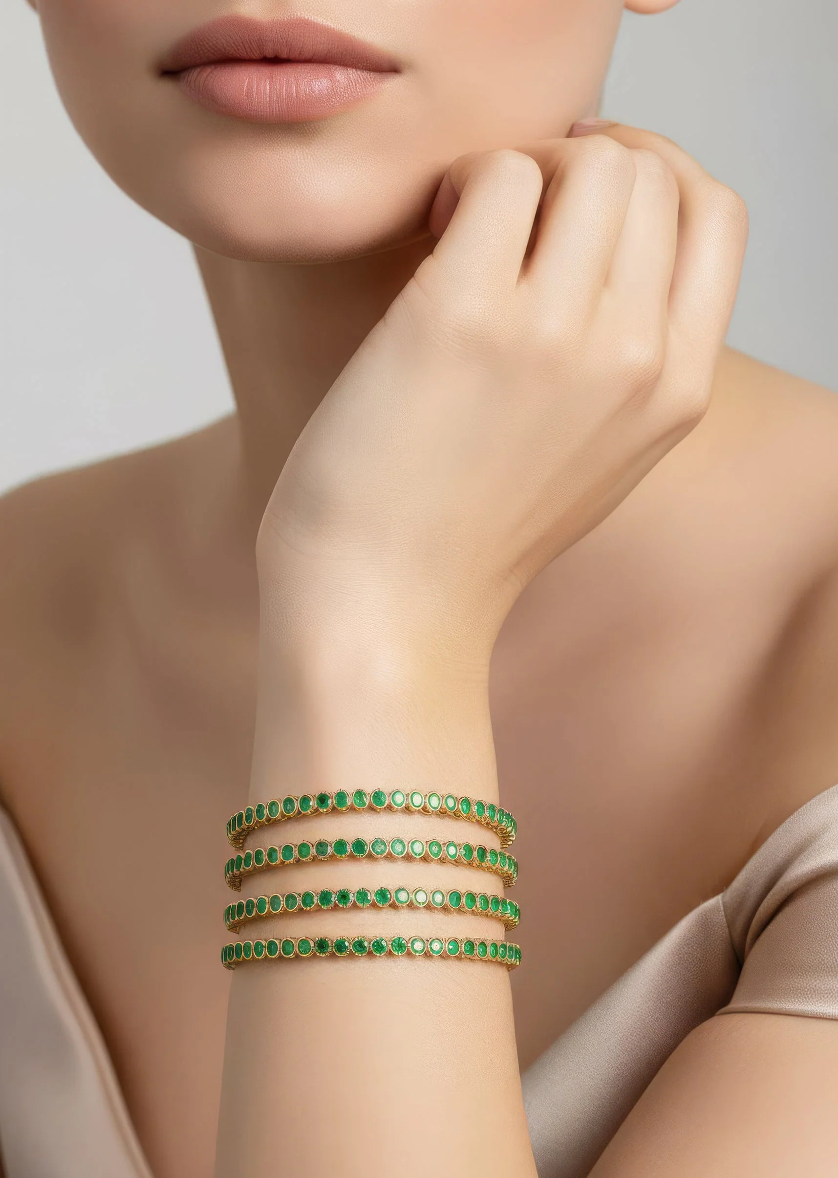 724-gold-finish-bangle-with-traditional-temple-motifs-and-green-simulated-stones-1.webp Gold Finish Bangle With Traditional Temple Motifs And Green Simulated Stones