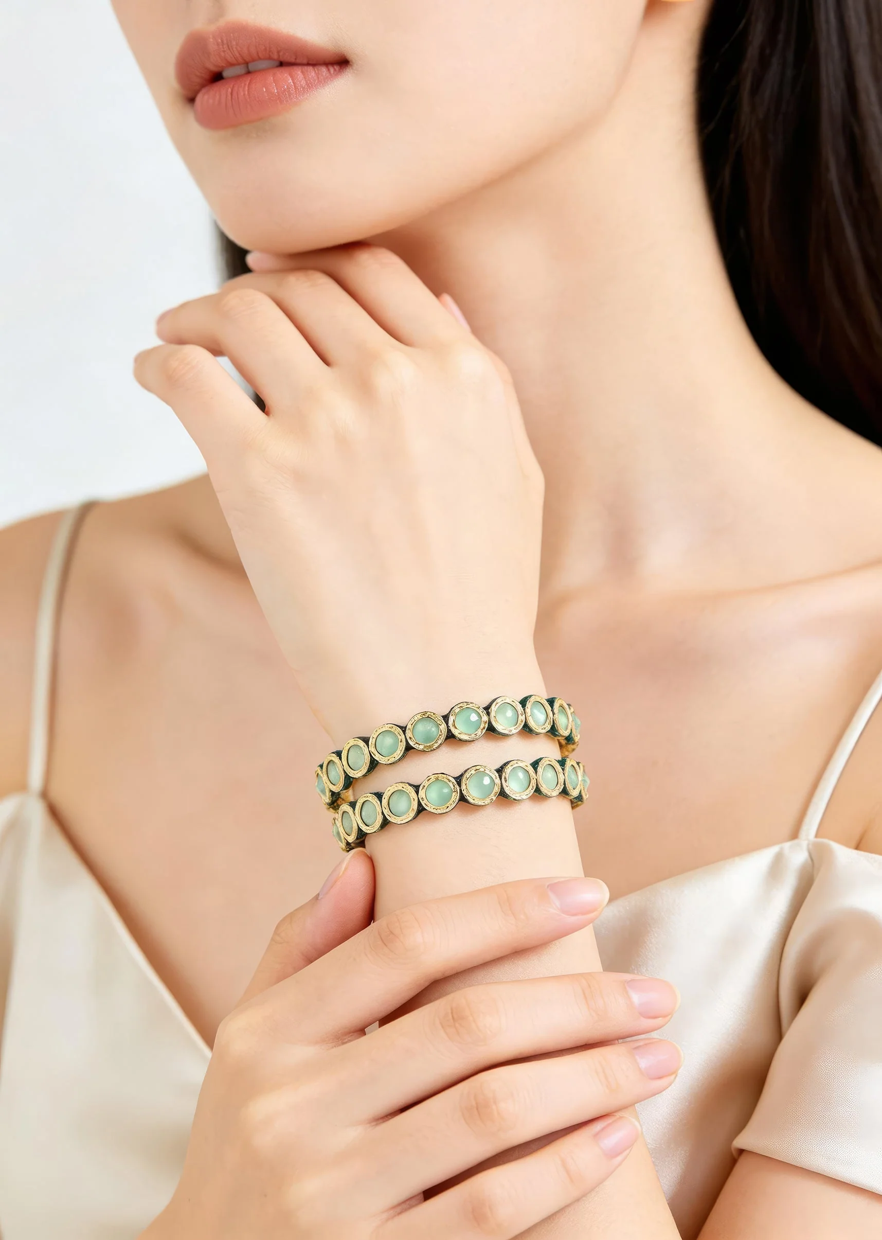 725-elegant-gold-tone-green-stone-bangles-for-women-1.webp Elegant Gold Tone Green Stone Bangles for Women